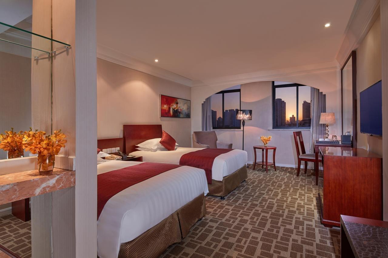 Shanghai New Century Manju Hotel Luoshan @Sniec Dış mekan fotoğraf