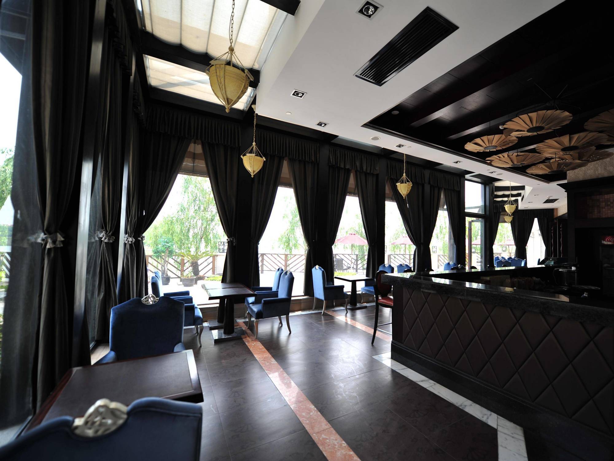 Shanghai New Century Manju Hotel Luoshan @Sniec Dış mekan fotoğraf